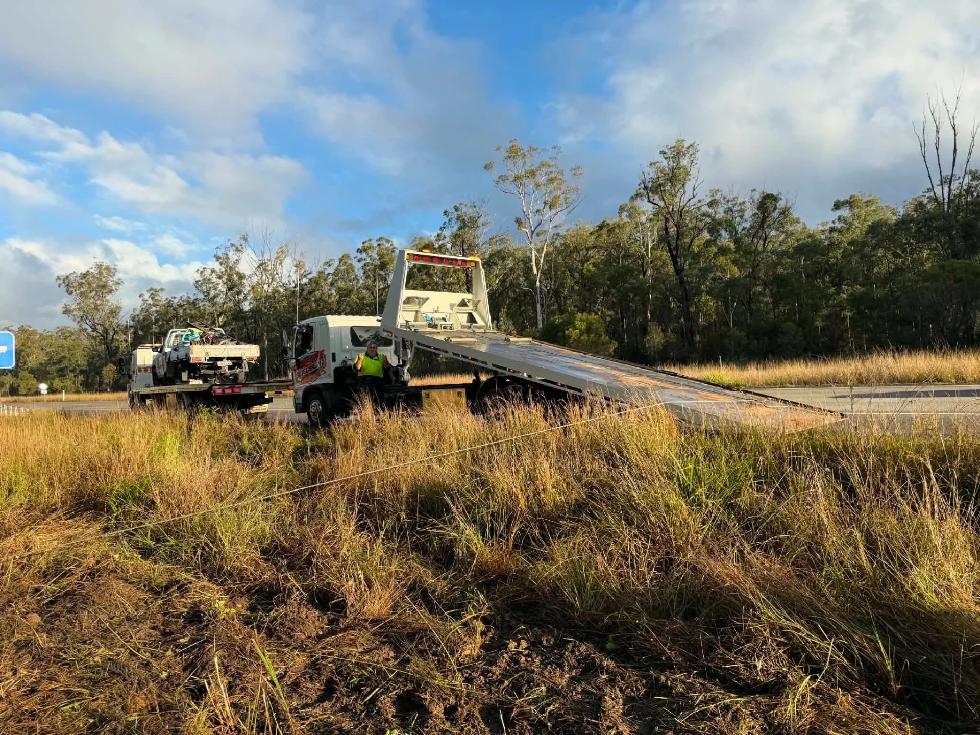 Tow truck attending a vehicle off the road in the Clarence Valley