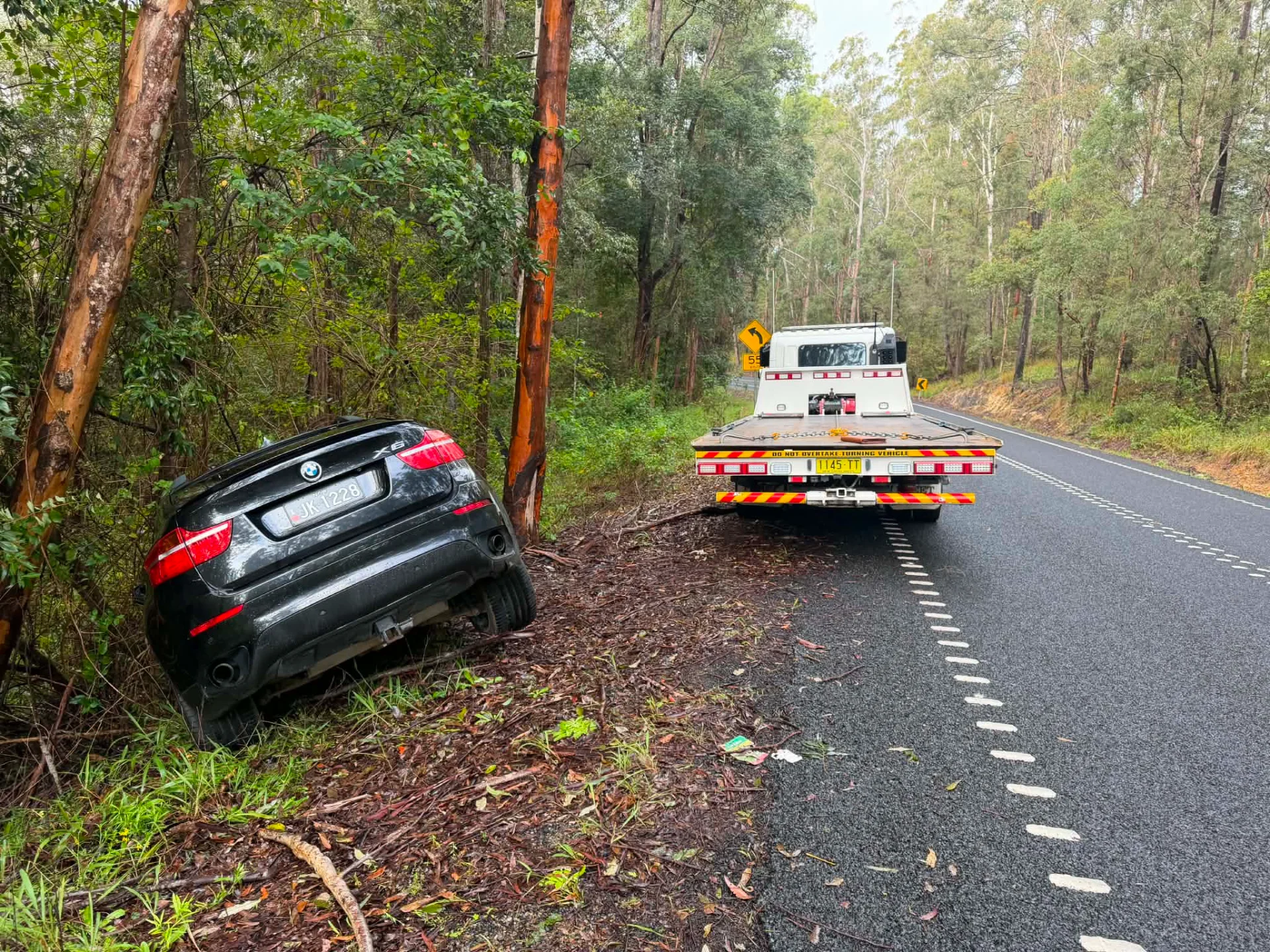 Clarence Valley Tow Trucks recovering a crashed car from the roadside
